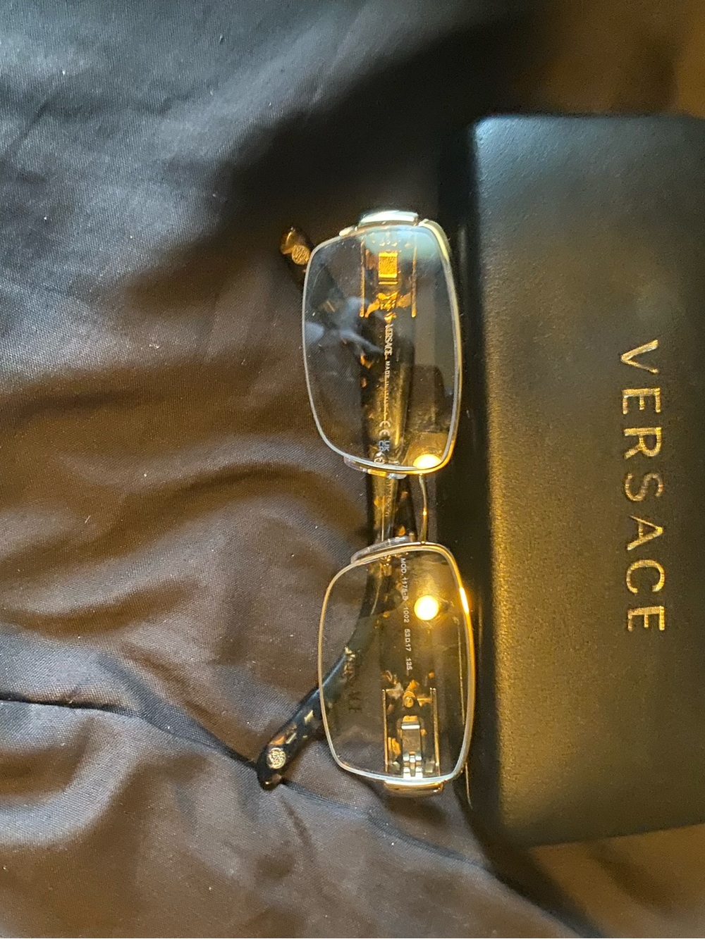 Versace Men's Rimless Glasses with Gold and Black Accents